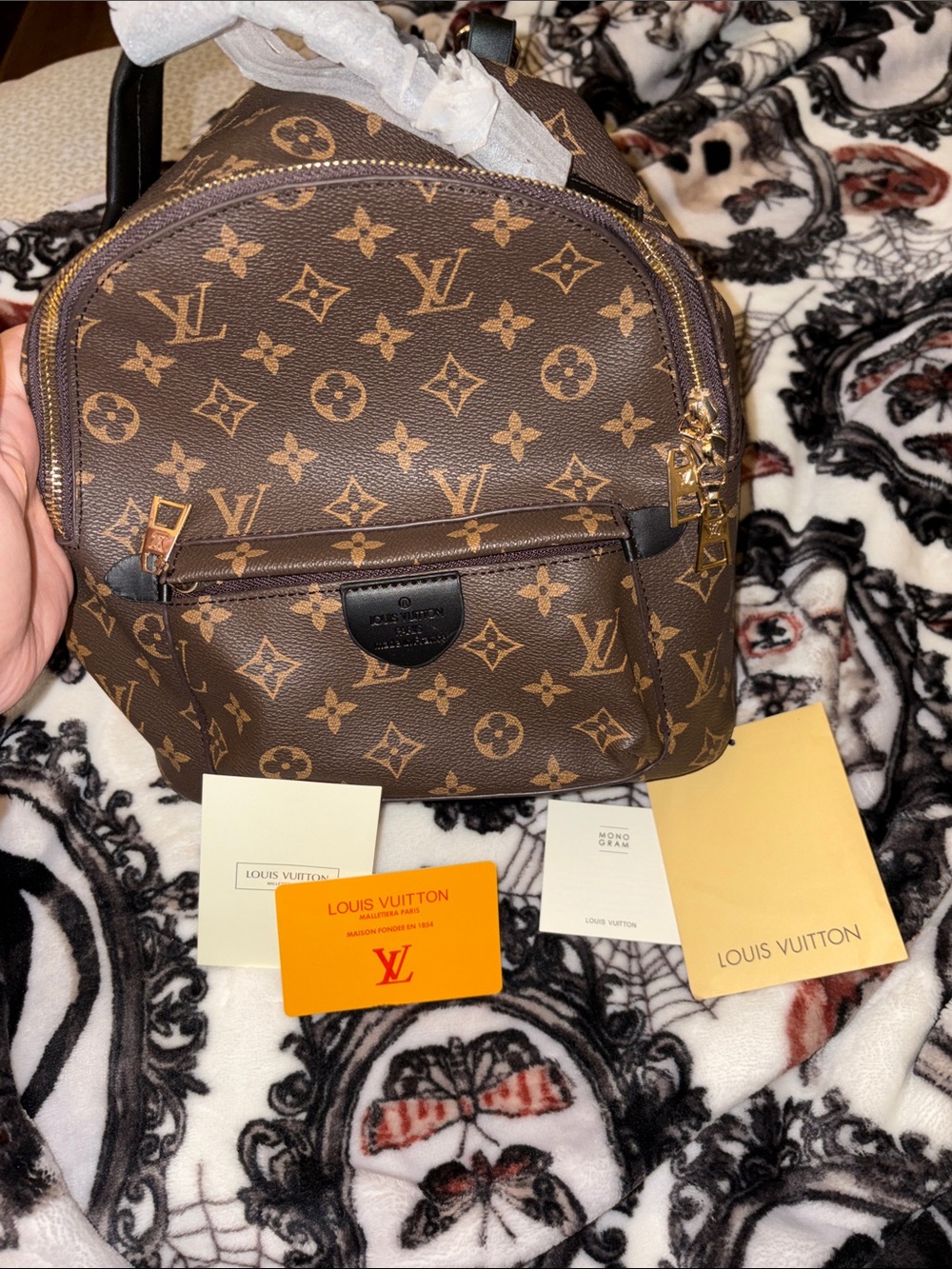 Louis Vuitton Monogram Canvas Mini Backpack in Brown and Gold missing strap